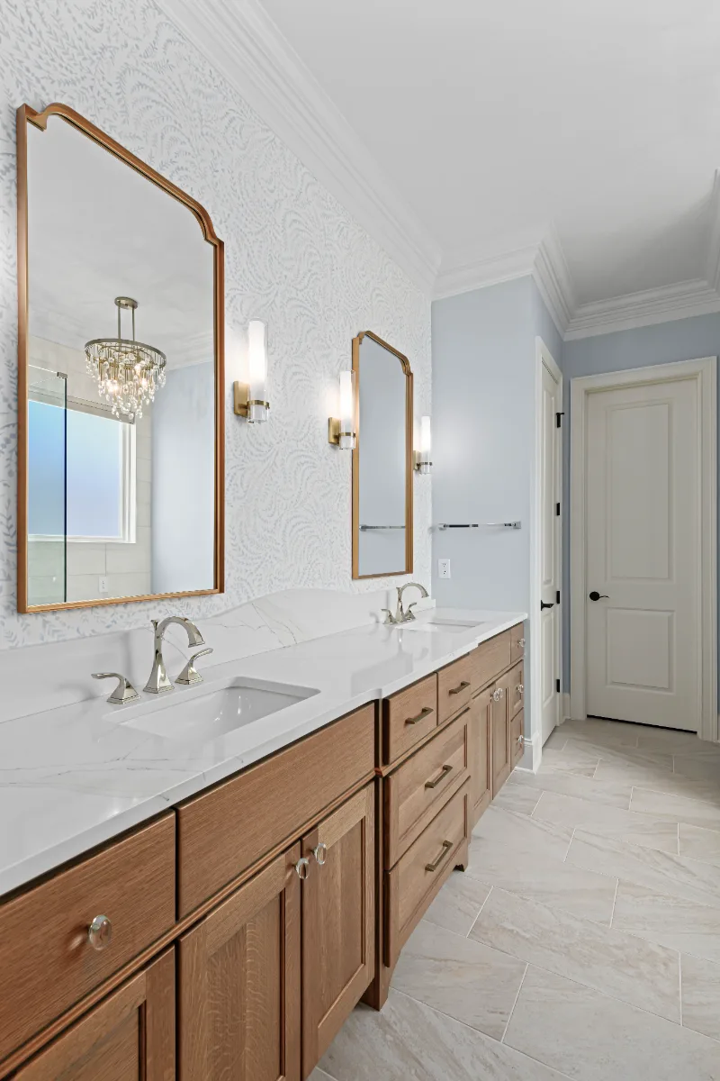A modern-crisp-elegant primary bath in Westhaven, Franklin TN 37064. CWP Quartersawn White Oak Sage cabinetry, MetroQuartz Calacatta Gold, Brizo Virage Polished Nickel, MLW Sedona White walls, and Adex Habitat River Blue Glossy accent tile by.