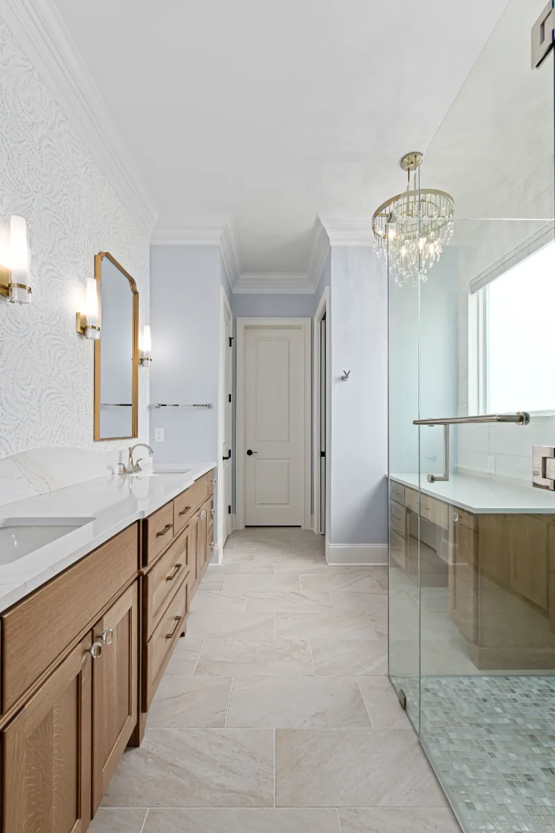 A modern-crisp-elegant primary bath in Westhaven, Franklin TN 37064. CWP Quartersawn White Oak Sage cabinetry, MetroQuartz Calacatta Gold, Brizo Virage Polished Nickel, MLW Sedona White walls, and Adex Habitat River Blue Glossy accent tile by.
