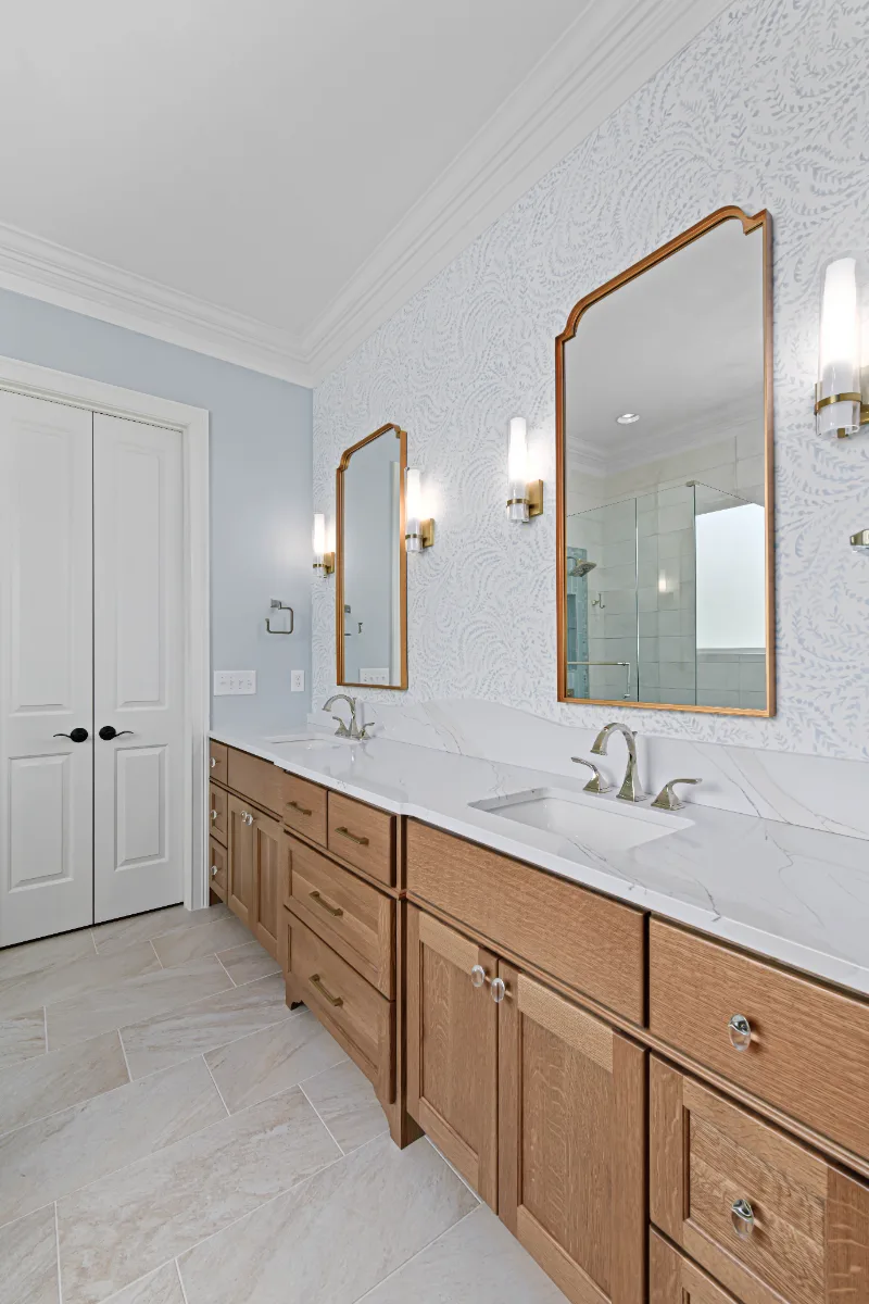 A modern-crisp-elegant primary bath in Westhaven, Franklin TN 37064. CWP Quartersawn White Oak Sage cabinetry, MetroQuartz Calacatta Gold, Brizo Virage Polished Nickel, MLW Sedona White walls, and Adex Habitat River Blue Glossy accent tile by.