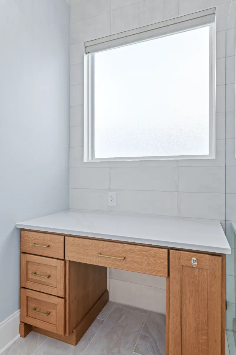 A modern-crisp-elegant primary bath in Westhaven, Franklin TN 37064. CWP Quartersawn White Oak Sage cabinetry, MetroQuartz Calacatta Gold, Brizo Virage Polished Nickel, MLW Sedona White walls, and Adex Habitat River Blue Glossy accent tile by.