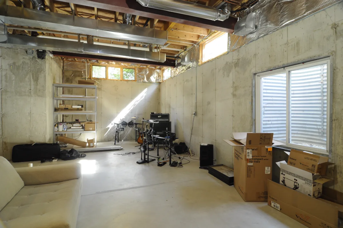 A modern-masculine basement stage in Brentwood, TN, part of a full basement remodel by Sebring Design Build. Specs pending photo verification.