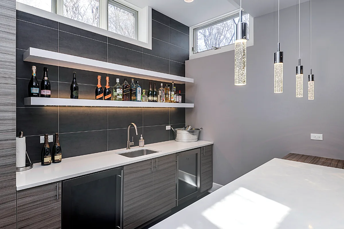 Bar remodel in Brentwood, TN. Sebring Design Build built this Brentwood, Tennessee basement bar as part of a modern-masculine basement remodel.