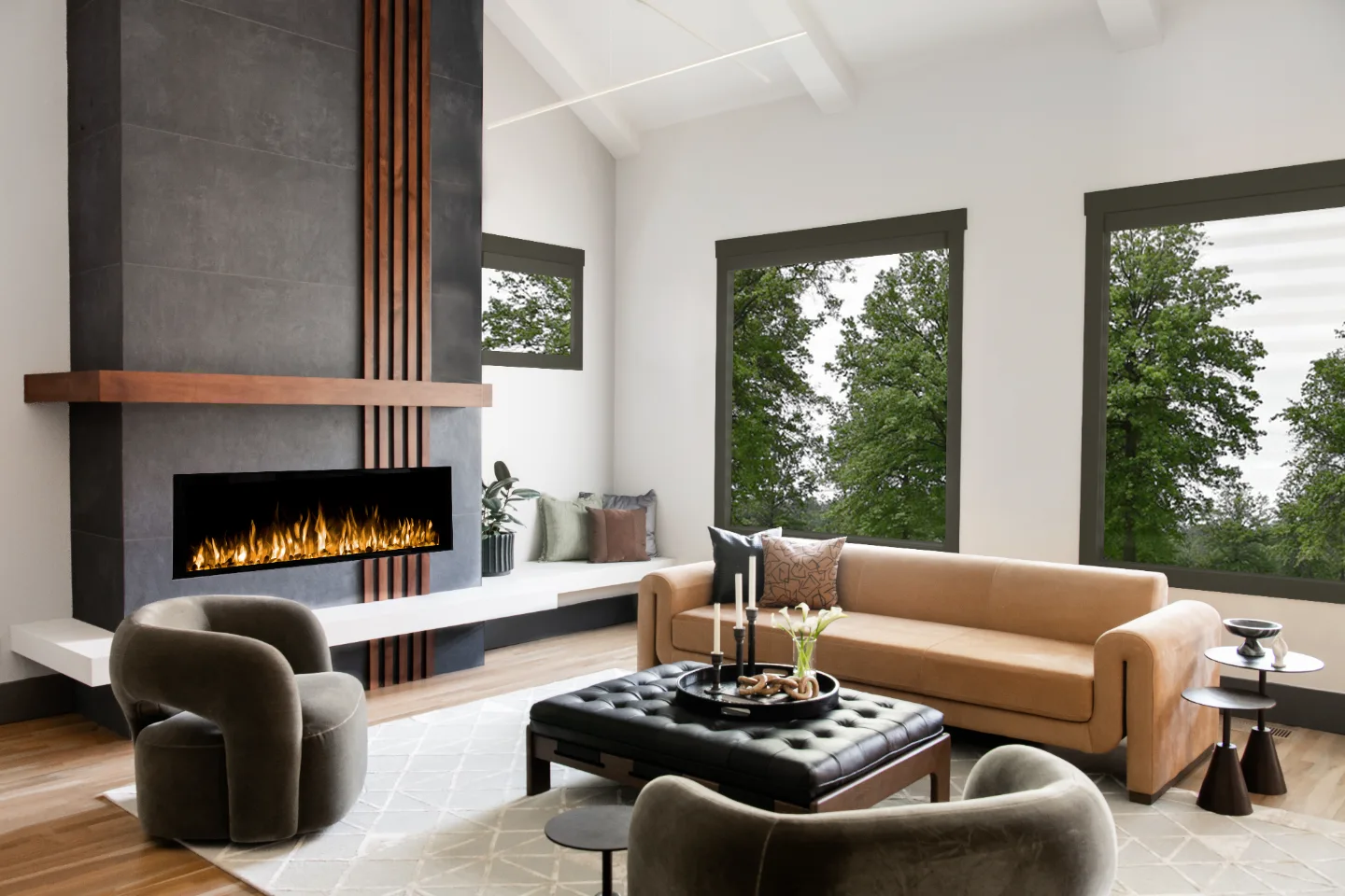 A contemporary-unique living room in Westhaven, Franklin TN 37064. Bold fireplace with Essential Graphite 24x48 tile, Alder Nutmeg wood slats and mantle, Siberia White Leathered hearth, and Schluter Dark Anthracite trim by Sebring Design Build.