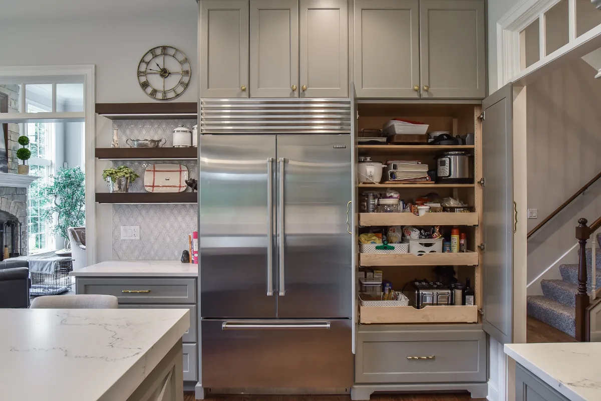 Kitchen remodel in Brentwood, TN. Sebring Design Build transformed this Brentwood, Tennessee kitchen with CWP Classic Square Recessed cabinetry with Drop Radius Edge in Fawn Brindle and Walnut Praline stain.