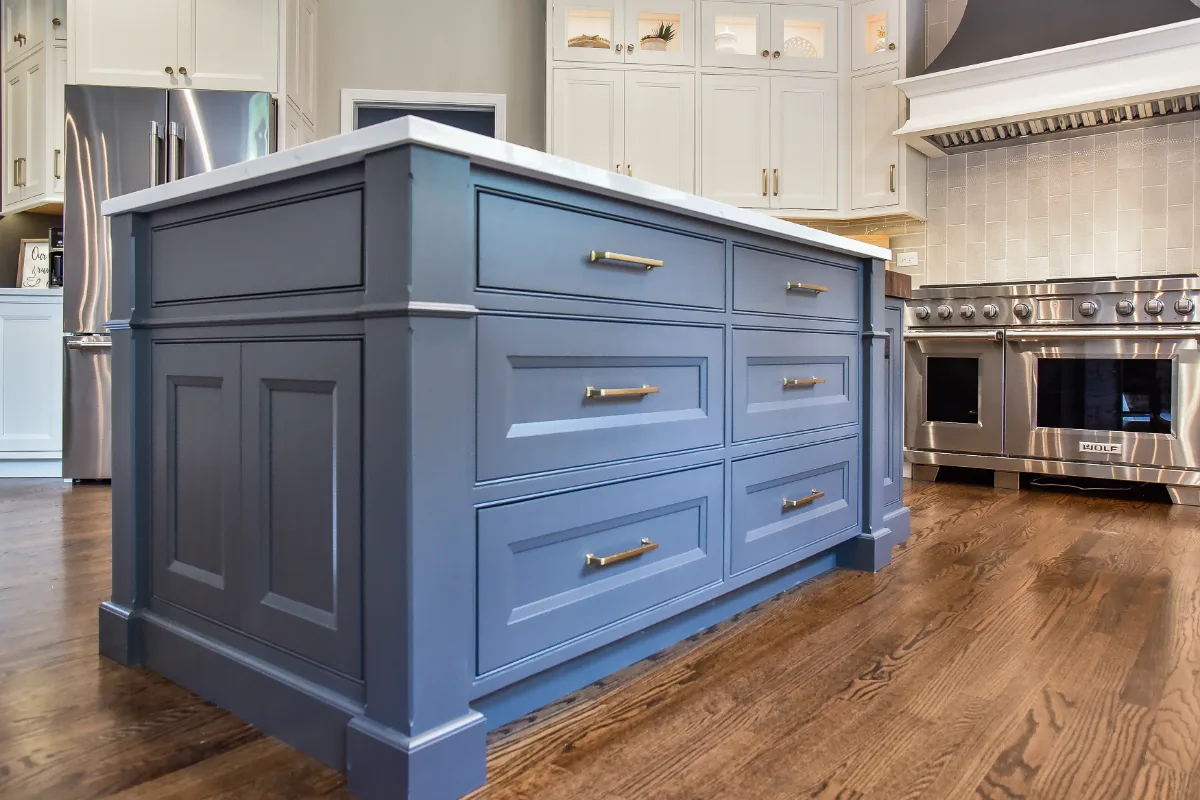 A transitional-warm kitchen in Brentwood, TN. CWP Snowbound and Urban Bronze Beaded Inset cabinetry, Orion Calacatta Aria quartz, Black Walnut end-grain island top, and Sonoma Stellar Metro Gray backsplash by Sebring Design Build.