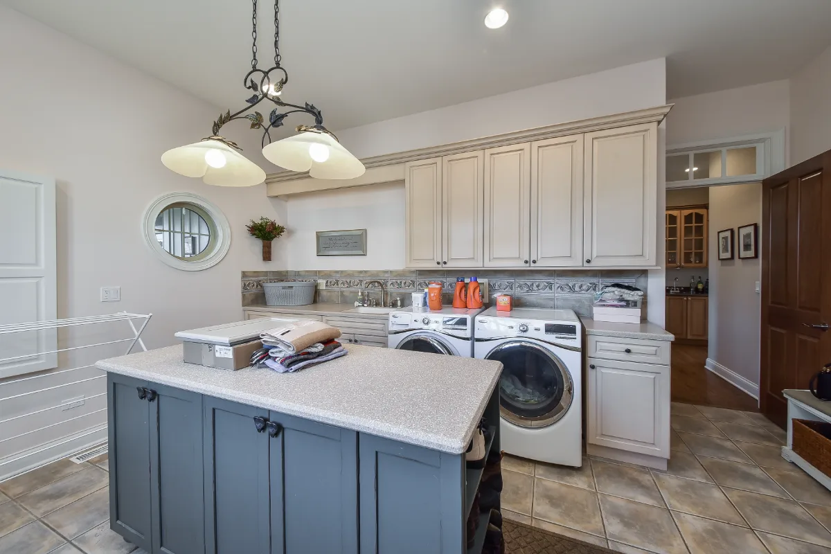 A transitional-elegant laundry room in Brentwood, TN, part of a five-space whole-home remodel by Sebring Design Build. Specs pending photo verification.