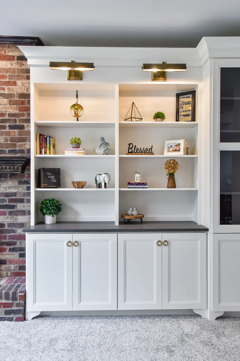 A transitional-warm living room in Brentwood, TN connected to a full kitchen remodel. Dark Walnut stained hardwood floors and warm material continuity by Sebring Design Build.