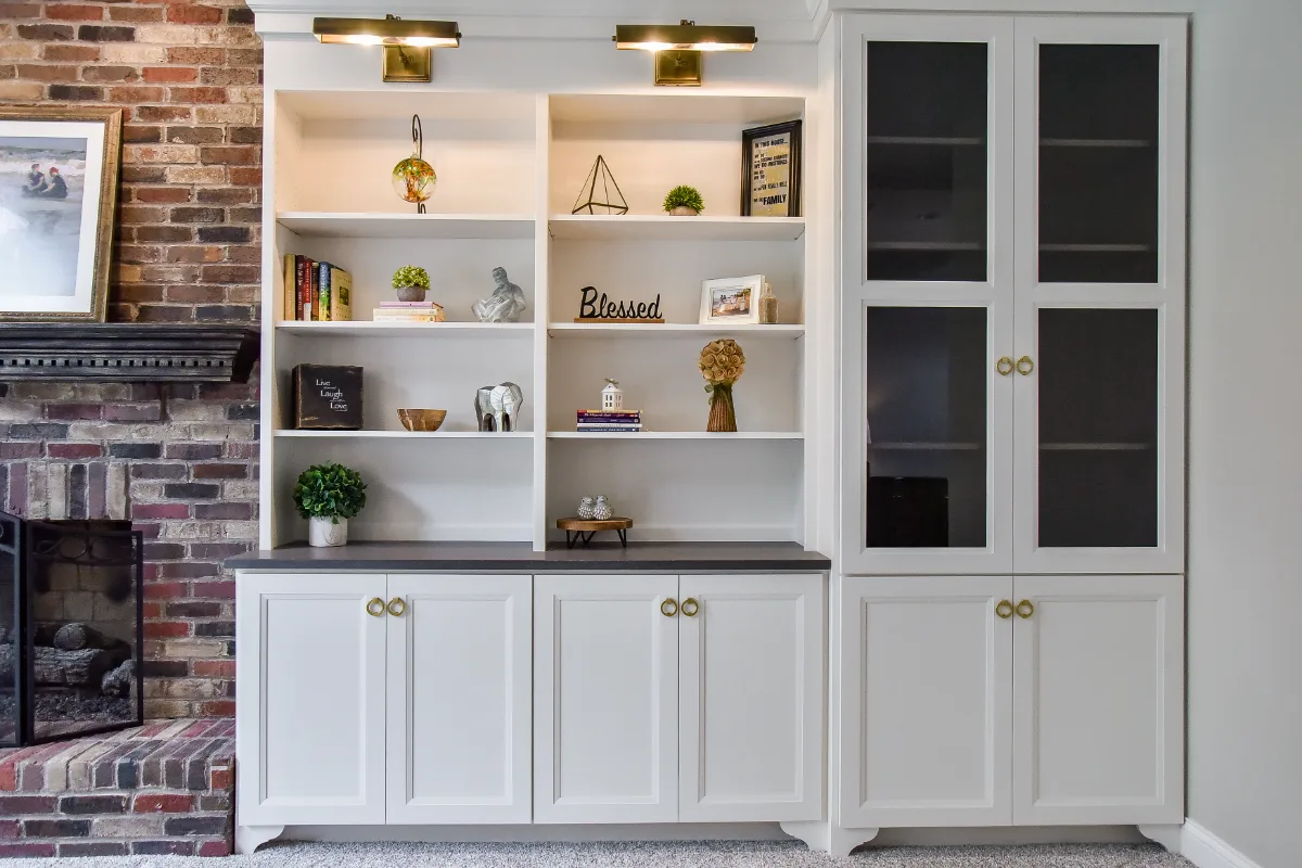 A transitional-warm living room in Brentwood, TN connected to a full kitchen remodel. Dark Walnut stained hardwood floors and warm material continuity by Sebring Design Build.
