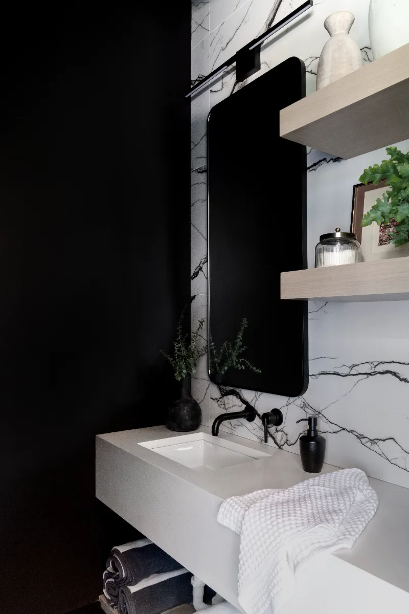 Guest Bath remodel in Columbia, TN. Sebring Design Build designed this Columbia, Tennessee guest bath with CWP Urbane Bronze Slab cabinetry, Metro Quartz Cemento 3CM countertops, Amerock Separa Black Brushed Nickel hardware.