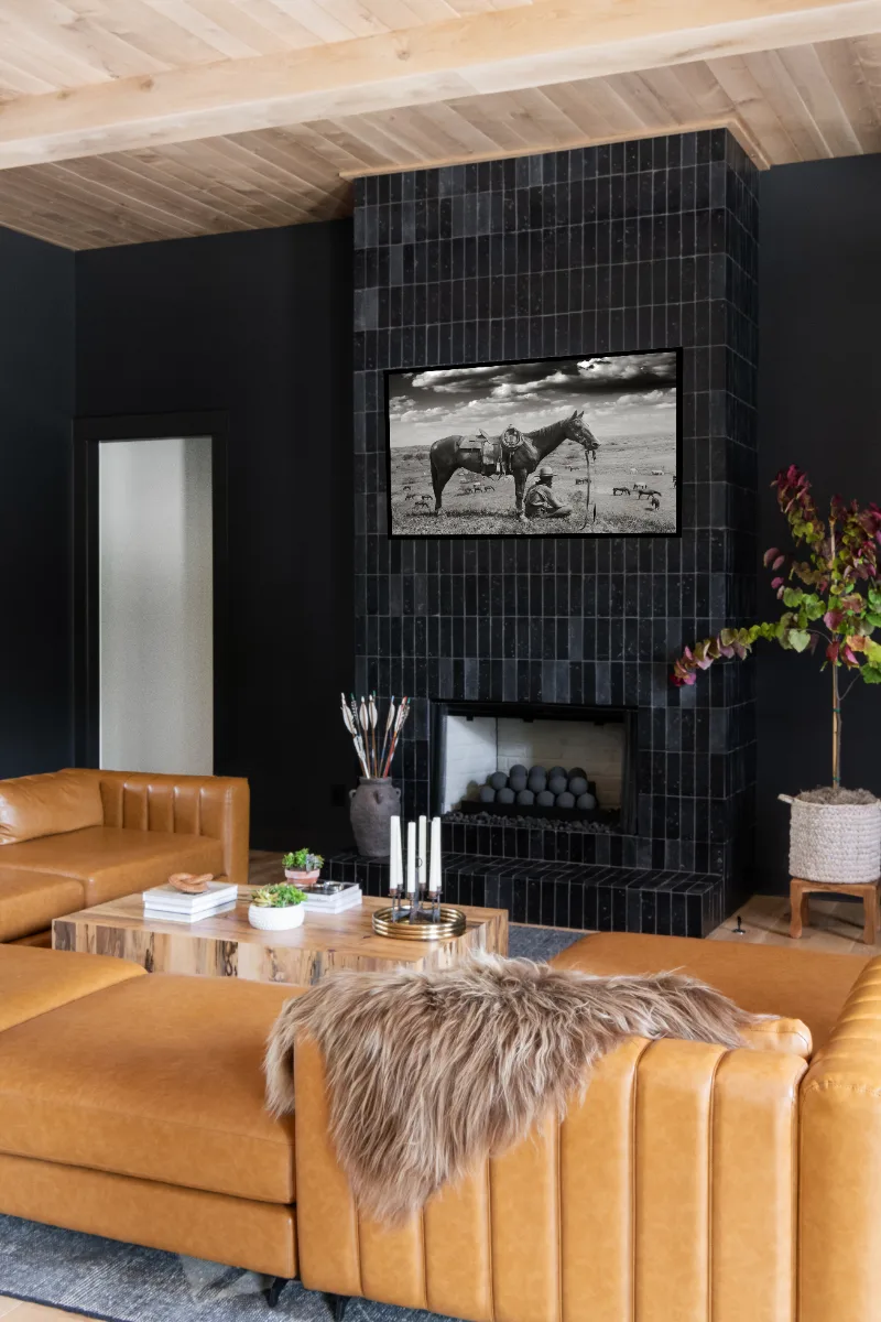 A unique-luxurious living room in Columbia, TN with natural wood tones, exposed brick archway, and warm contemporary design by Sebring Design Build. Specs pending photo verification.