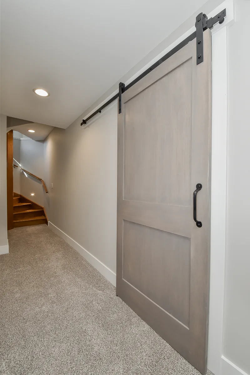 Workshop remodel in Franklin, TN. Sebring Design Build finished this Franklin basement workshop with a concrete floor finish built for real work: durable, honest to the space's purpose.