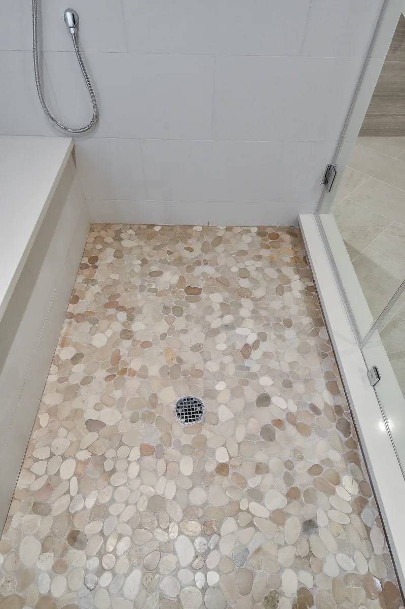 Guest Bath remodel in Franklin, TN. Sebring Design Build designed this Franklin basement guest bath with Maple Standard Slab cabinetry, Hanstone Chia quartz, an Elkay Revere sink, Moen Voss Chrome faucet.