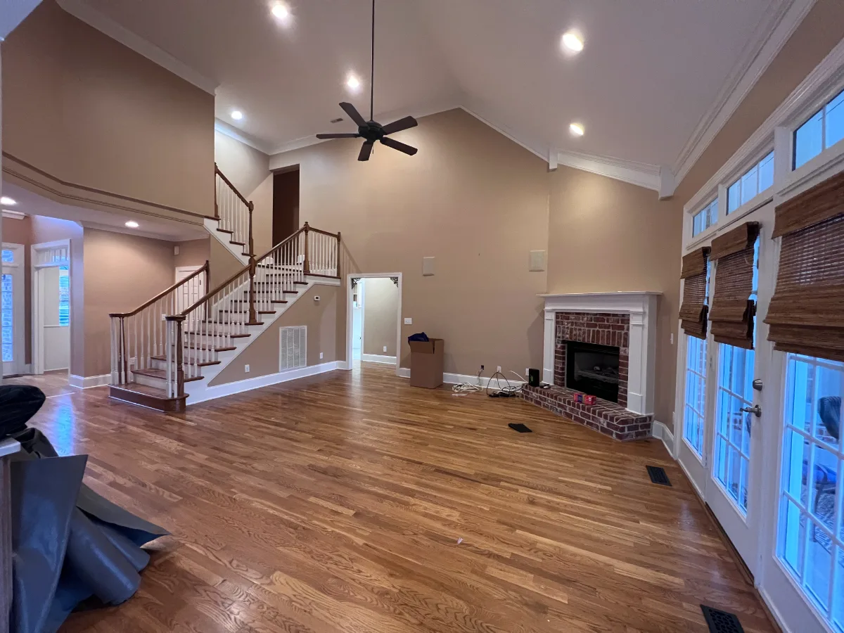 A modern-elegant living room remodel in Watkins Creek, Franklin TN 37067, part of a nine-space whole house remodel. Warm natural materials and refined finishes by Sebring Design Build.
