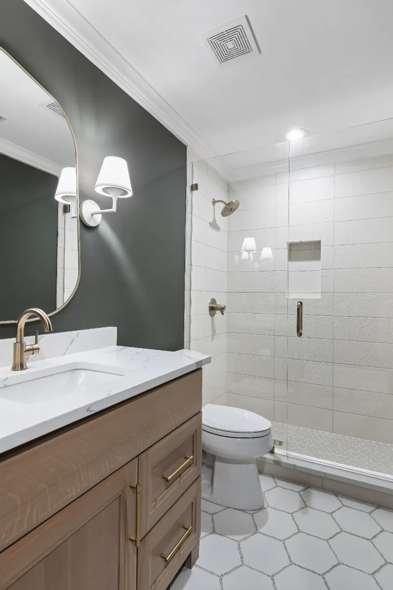 Guest Bath remodel in Watkins Creek, TN. Sebring Design Build designed this Watkins Creek guest bath (HER) in Franklin, Tennessee with White Oak Tatami cabinetry, Mikado Calacatta Tree quartz.