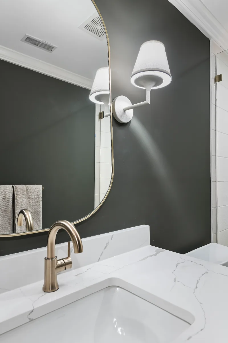 Guest Bath remodel in Watkins Creek, TN. Sebring Design Build designed this Watkins Creek guest bath (HER) in Franklin, Tennessee with White Oak Tatami cabinetry, Mikado Calacatta Tree quartz.