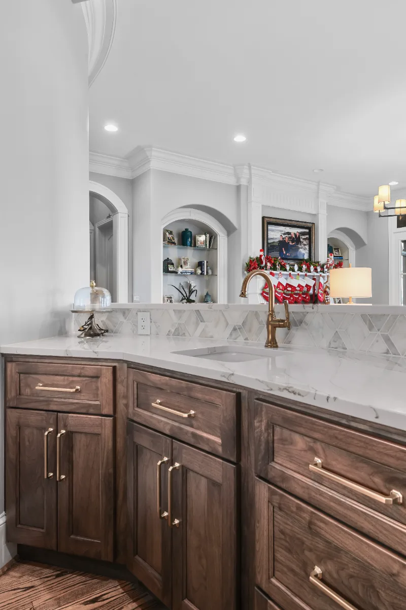 Kitchen remodel in Governors Club, Brentwood TN. Elegant, light palette with custom cabinetry and stone countertops by Sebring Design Build.