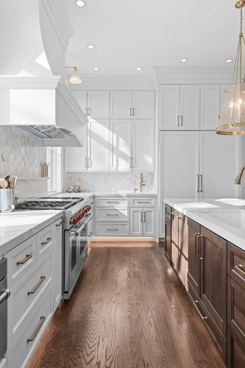 Kitchen remodel in Governors Club, Brentwood TN. Elegant, light palette with custom cabinetry and stone countertops by Sebring Design Build.