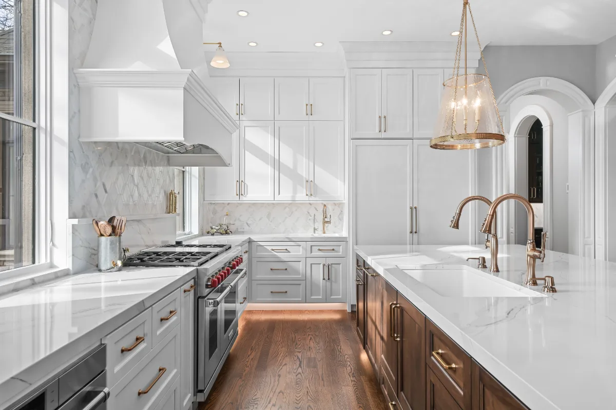 Kitchen remodel in Governors Club, Brentwood TN. Elegant, light palette with custom cabinetry and stone countertops by Sebring Design Build.