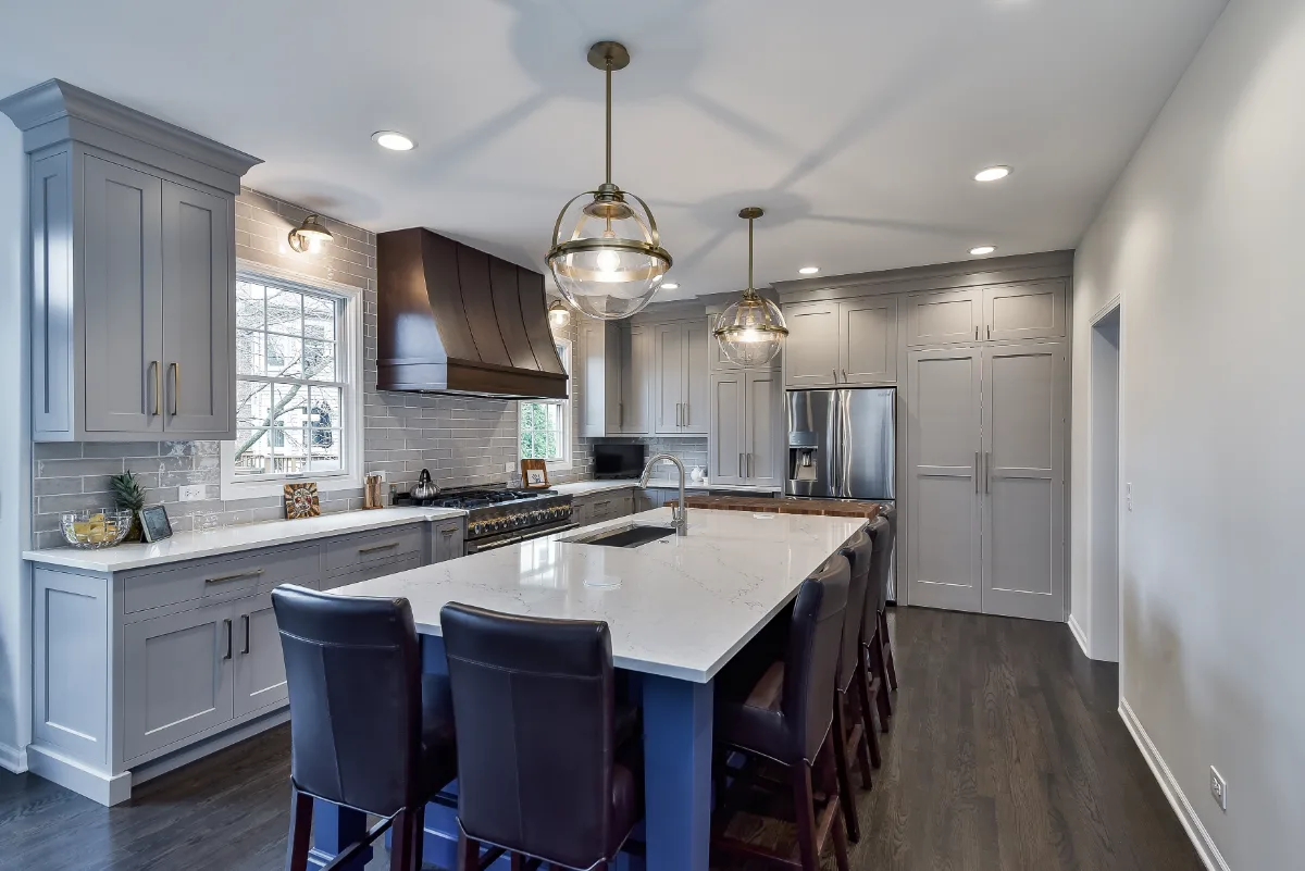 Two-tone kitchen remodel in Franklin, TN with metropolitan style and balanced design. Functional and refined by Sebring Design Build.