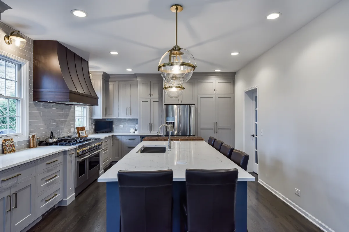 Two-tone kitchen remodel in Franklin, TN with metropolitan style and balanced design. Functional and refined by Sebring Design Build.
