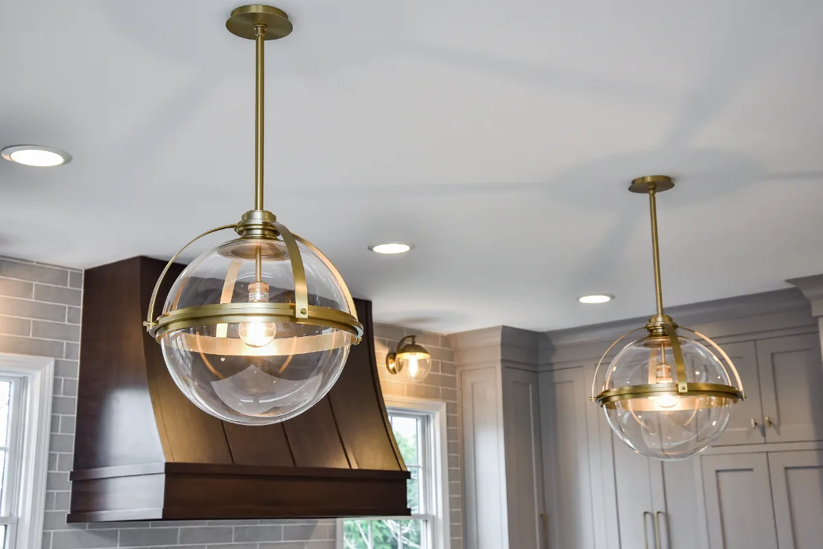 Two-tone kitchen remodel in Franklin, TN with metropolitan style and balanced design. Functional and refined by Sebring Design Build.