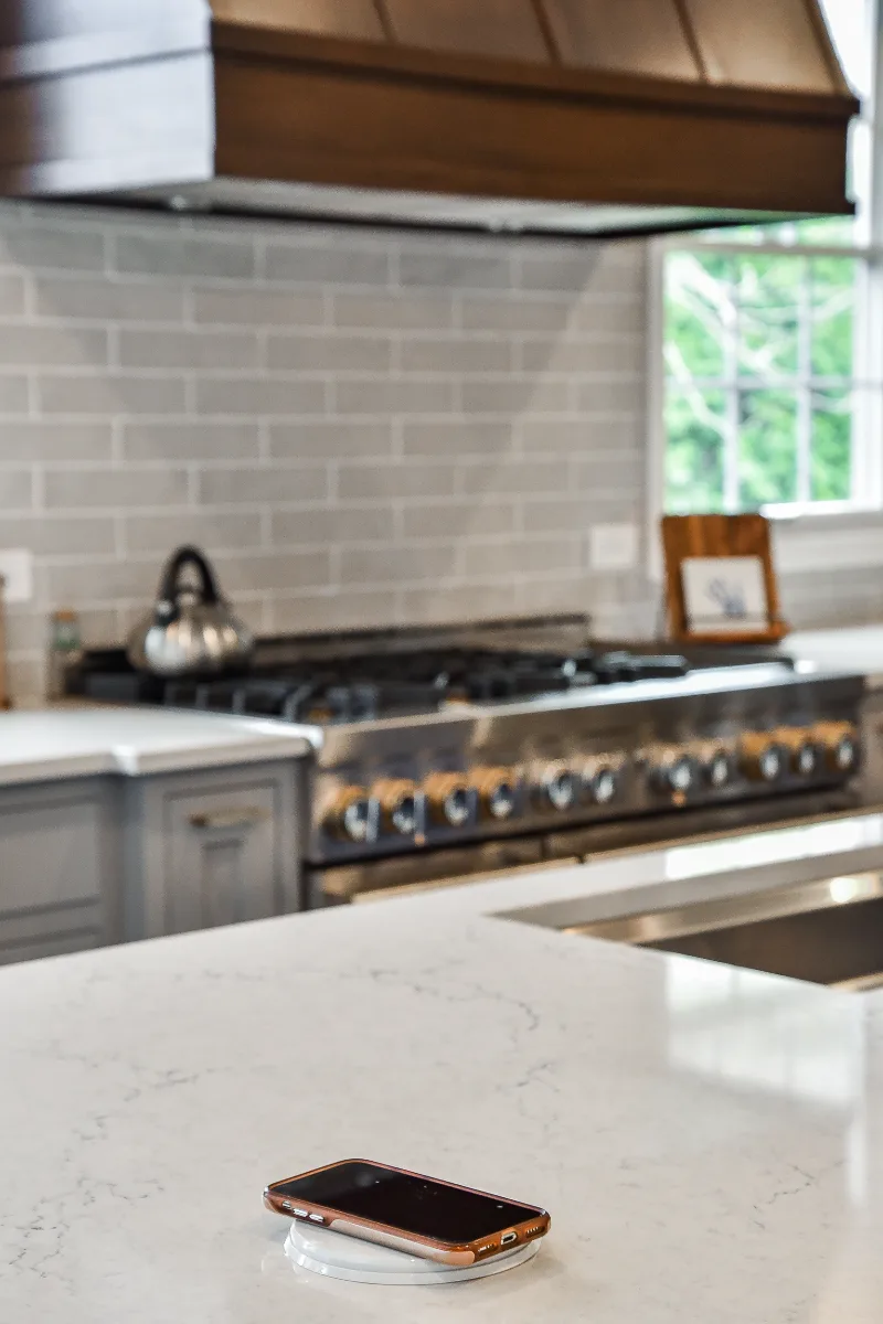 Two-tone kitchen remodel in Franklin, TN with metropolitan style and balanced design. Functional and refined by Sebring Design Build.