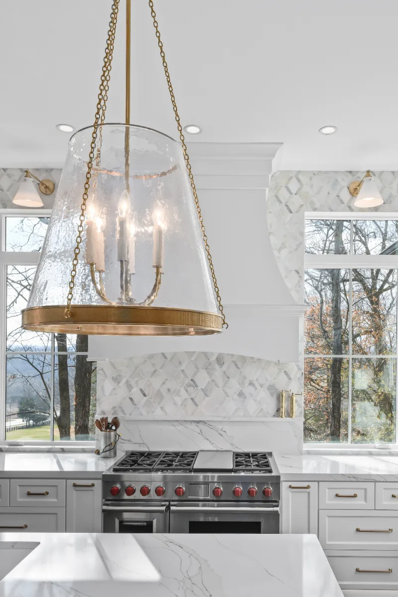 Kitchen remodel in Governors Club, Brentwood TN. Elegant, light palette with custom cabinetry and stone countertops by Sebring Design Build.