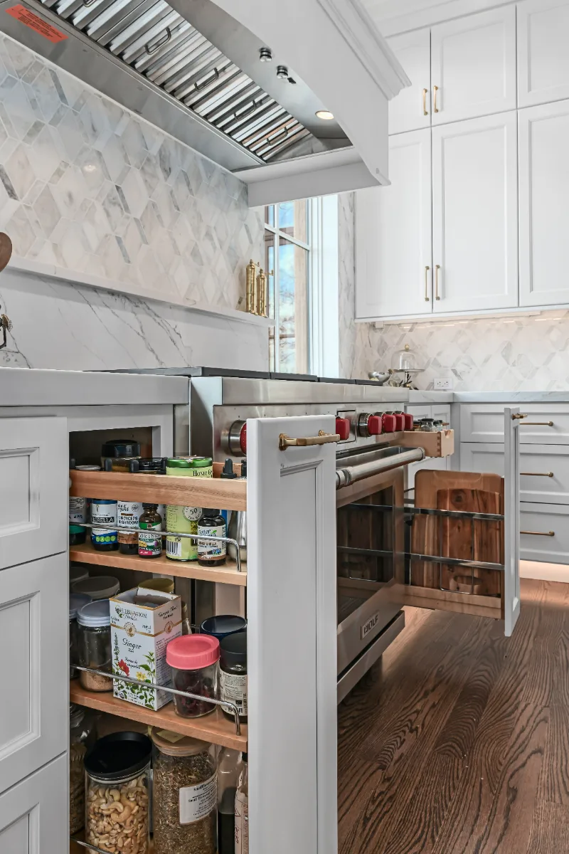 Kitchen remodel in Governors Club, Brentwood TN. Elegant, light palette with custom cabinetry and stone countertops by Sebring Design Build.