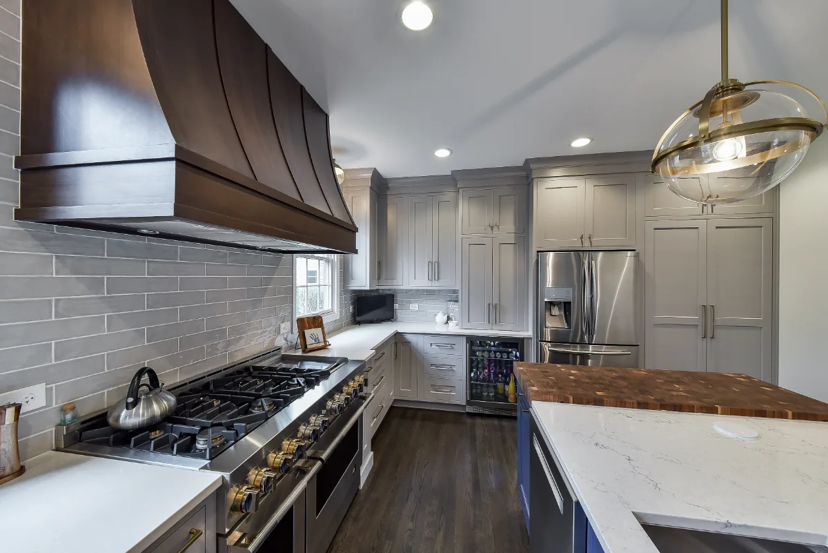 Two-tone kitchen remodel in Franklin, TN with metropolitan style and balanced design. Functional and refined by Sebring Design Build.