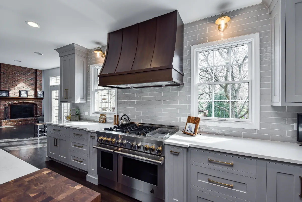 Two-tone kitchen remodel in Franklin, TN with metropolitan style and balanced design. Functional and refined by Sebring Design Build.