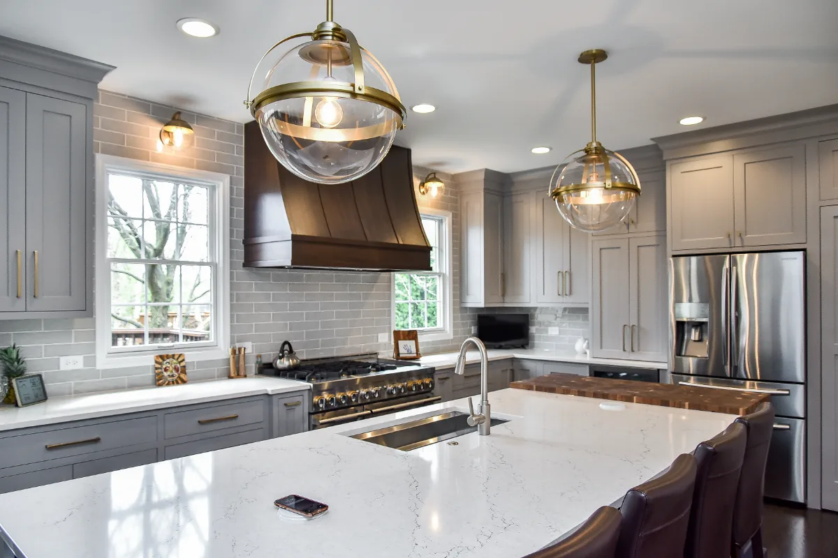Two-tone kitchen remodel in Franklin, TN with metropolitan style and balanced design. Functional and refined by Sebring Design Build.