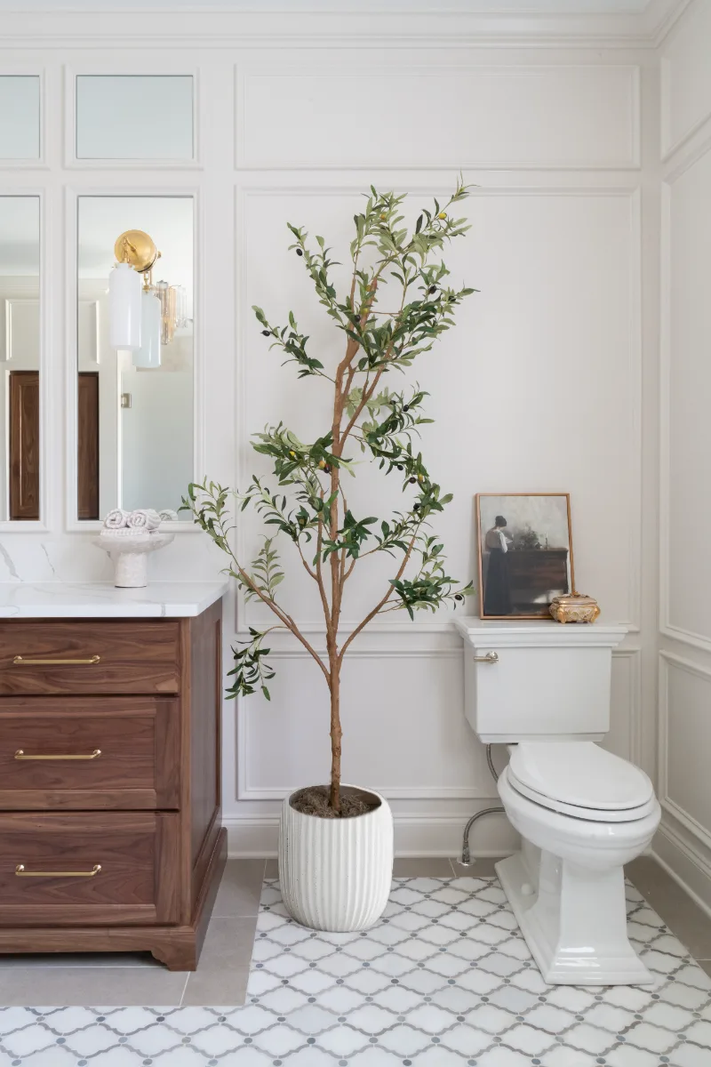 An elegant-classic primary bath remodel in Willowsprings, Franklin TN 37064. CWP Walnut Natural Solid Wood Panel cabinetry, Mikado Calacatta Gold quartz, Brizo Invari Polished Nickel, Gallery Pearl shower tile, and Empyrean Ice Blend floor by.