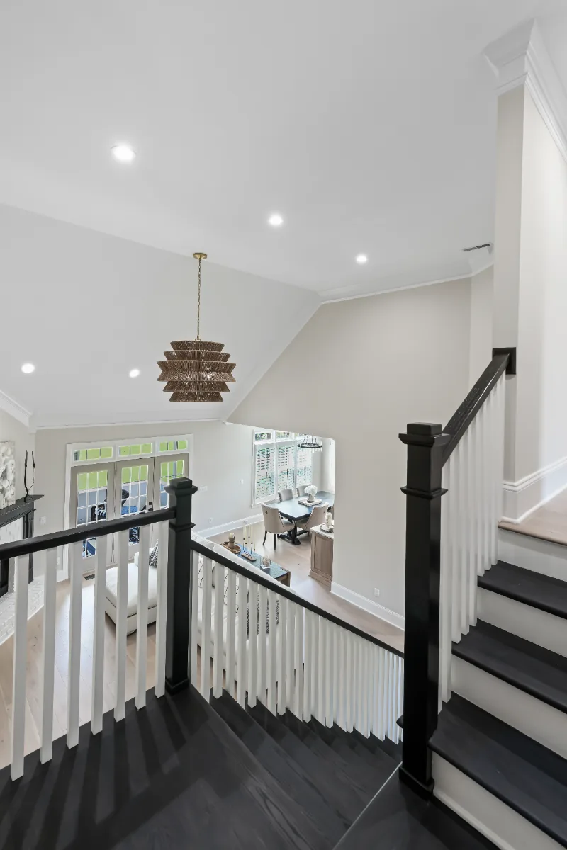 A modern-elegant living room remodel in Watkins Creek, Franklin TN 37067, part of a nine-space whole house remodel. Warm natural materials and refined finishes by Sebring Design Build.Living Room remodel in Watkins Creek, TN. Sebring Design Build transform