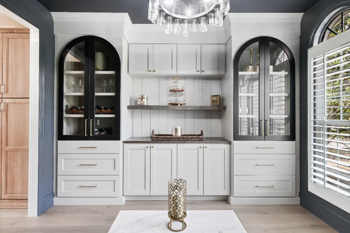 A modern-elegant whole house remodel in Watkins Creek, Franklin TN 37067. Nine spaces transformed with White Oak cabinetry, Mikado quartz, and Honey Bronze hardware by Sebring Design Build.