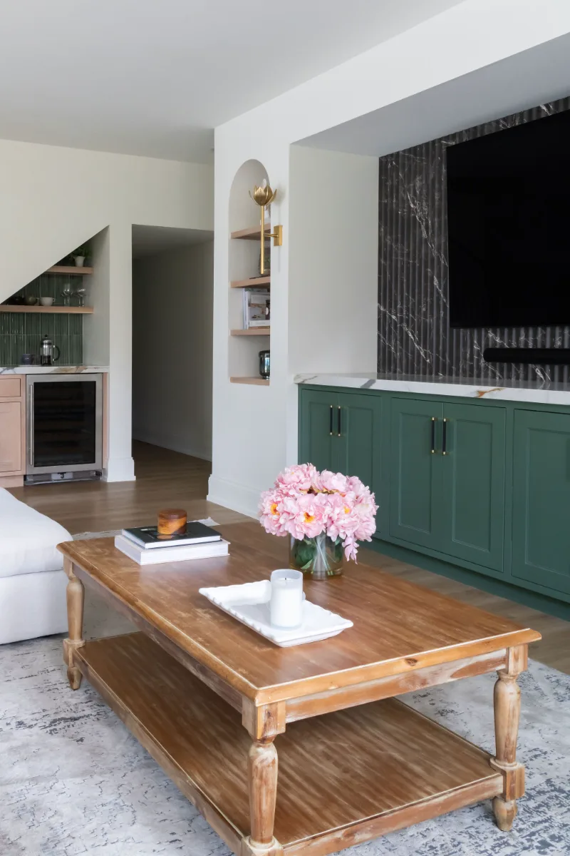 Bar remodel in Franklin, TN. Sebring Design Build built this Bonbrook basement bar in Brentwood, Tennessee with Alder and White Oak cabinetry in Smoke and Champagne finishes.