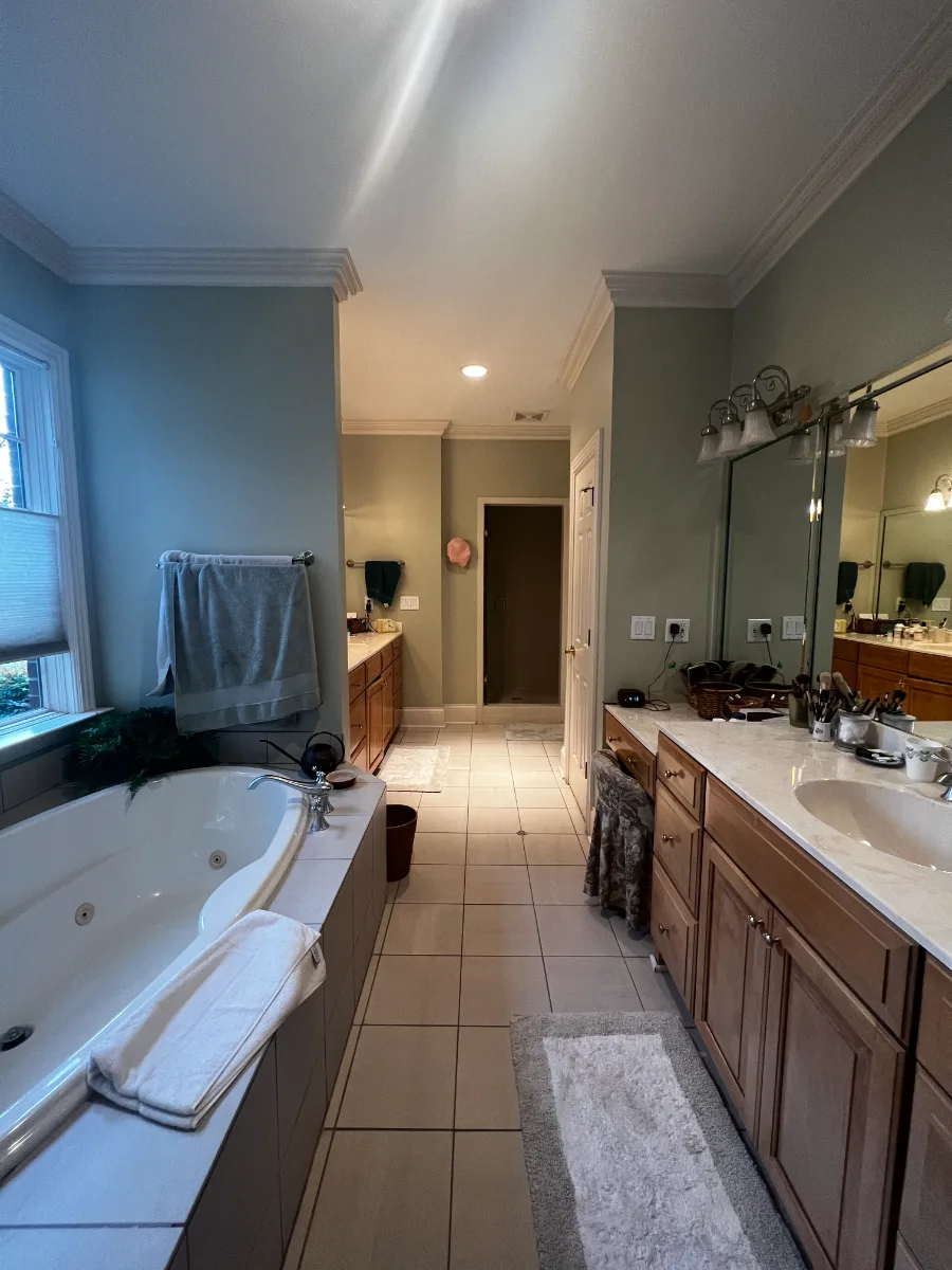 A classic-transitional primary bath remodel in Bonbrook, Brentwood TN 37027. Beaded inset cabinetry in Shaker Gray, Cambria Ella quartz, Diamond Carrara tile, and Rohl Satin Nickel fixtures by Sebring Design Build.