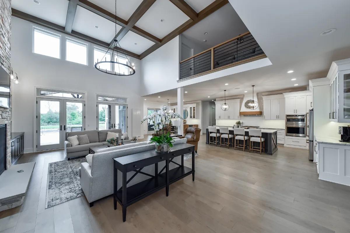 A transitional-elegant living room refresh in Franklin, TN, coordinated with a full kitchen and primary bath remodel. Warm natural materials and refined finishes by Sebring Design Build.