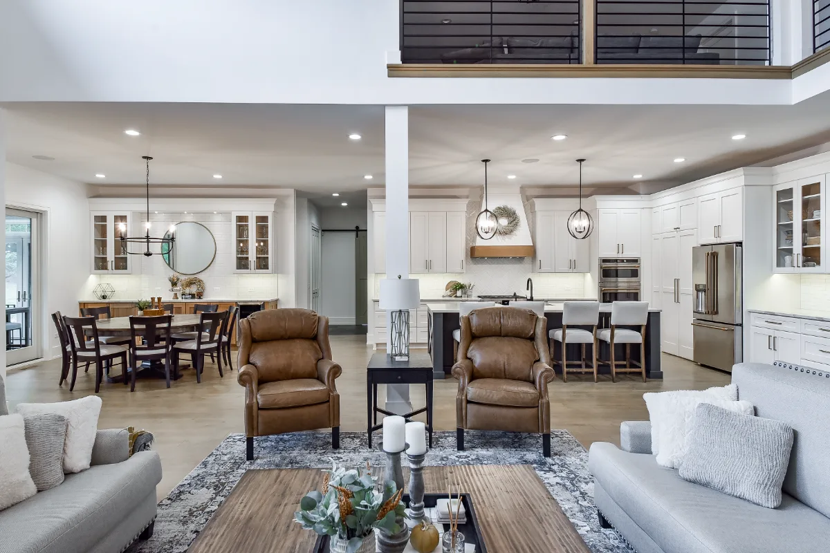 A transitional-elegant living room refresh in Franklin, TN, coordinated with a full kitchen and primary bath remodel. Warm natural materials and refined finishes by Sebring Design Build.