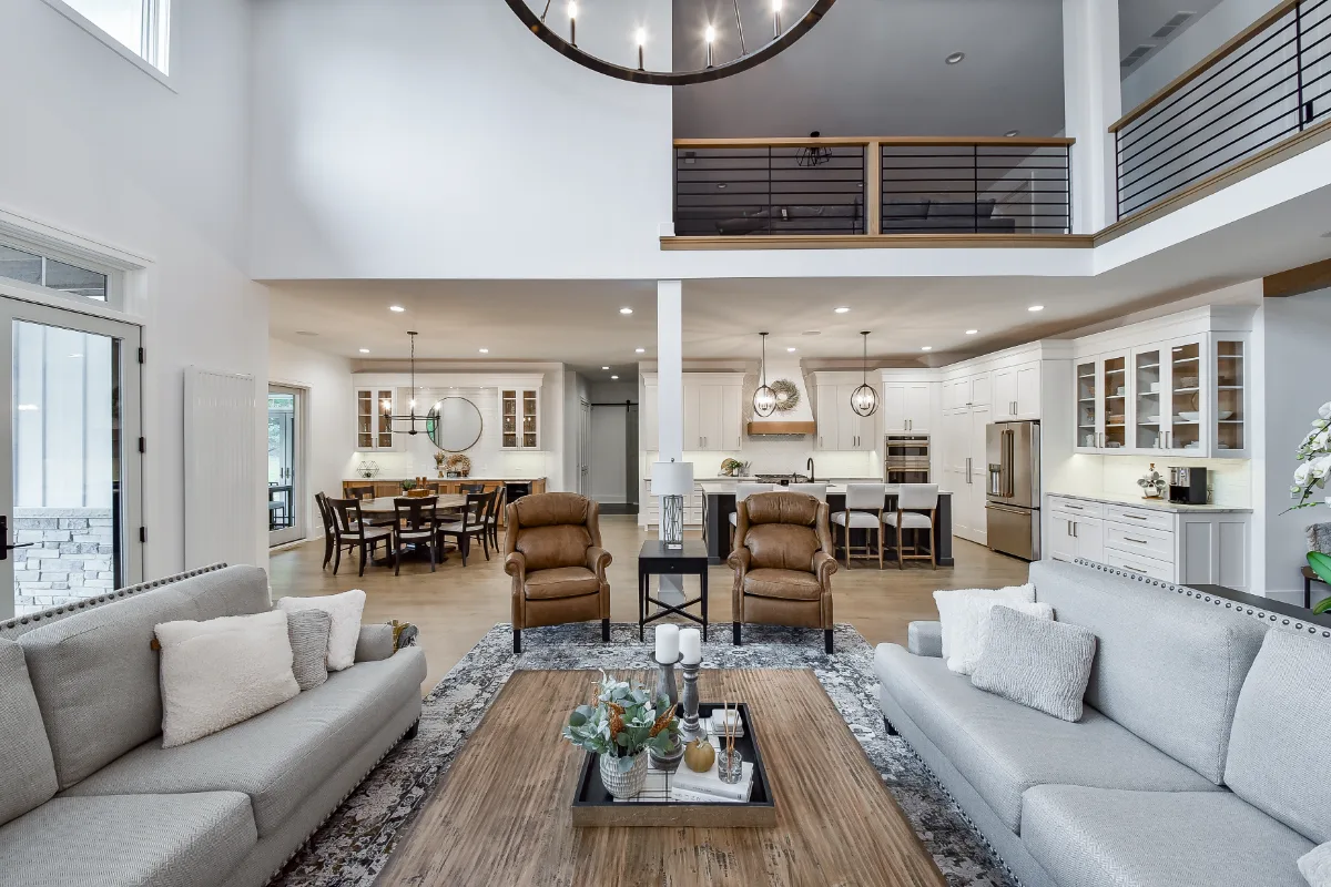 A transitional-elegant living room refresh in Franklin, TN, coordinated with a full kitchen and primary bath remodel. Warm natural materials and refined finishes by Sebring Design Build.