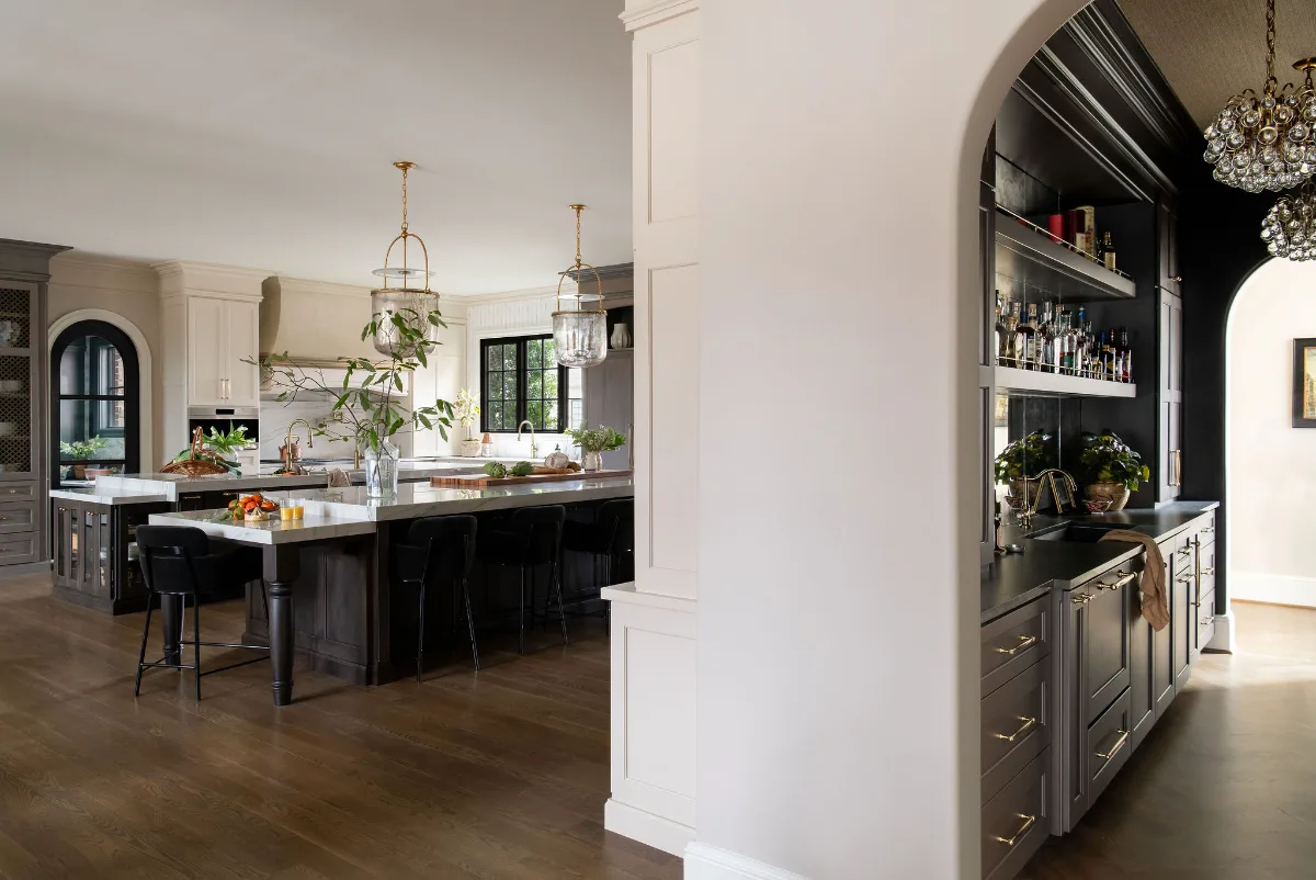Custom kitchen remodel in McGavock Farms, Brentwood. White oak rift sawn island, Maison Blanche cabinetry, Calacatta quartz, and brass fixtures by Sebring Design Build.