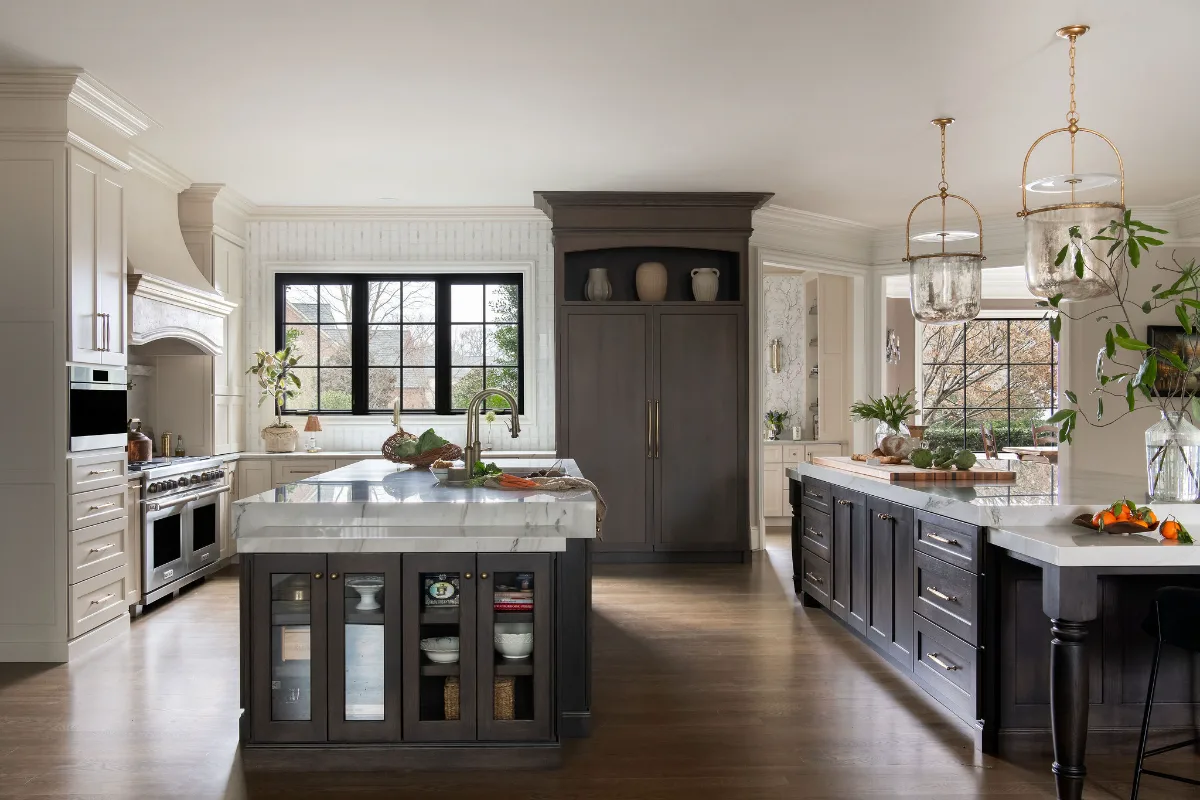 Custom kitchen remodel in McGavock Farms, Brentwood. White oak rift sawn island, Maison Blanche cabinetry, Calacatta quartz, and brass fixtures by Sebring Design Build.