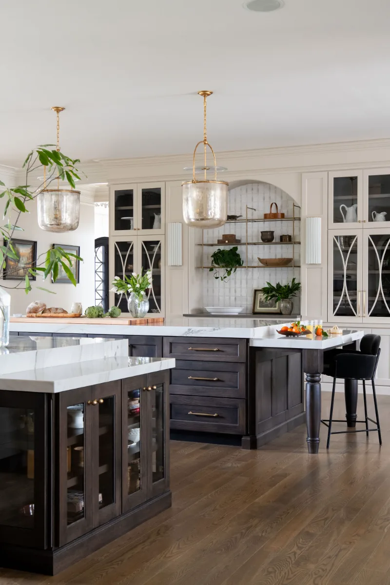 Custom kitchen remodel in McGavock Farms, Brentwood. White oak rift sawn island, Maison Blanche cabinetry, Calacatta quartz, and brass fixtures by Sebring Design Build.