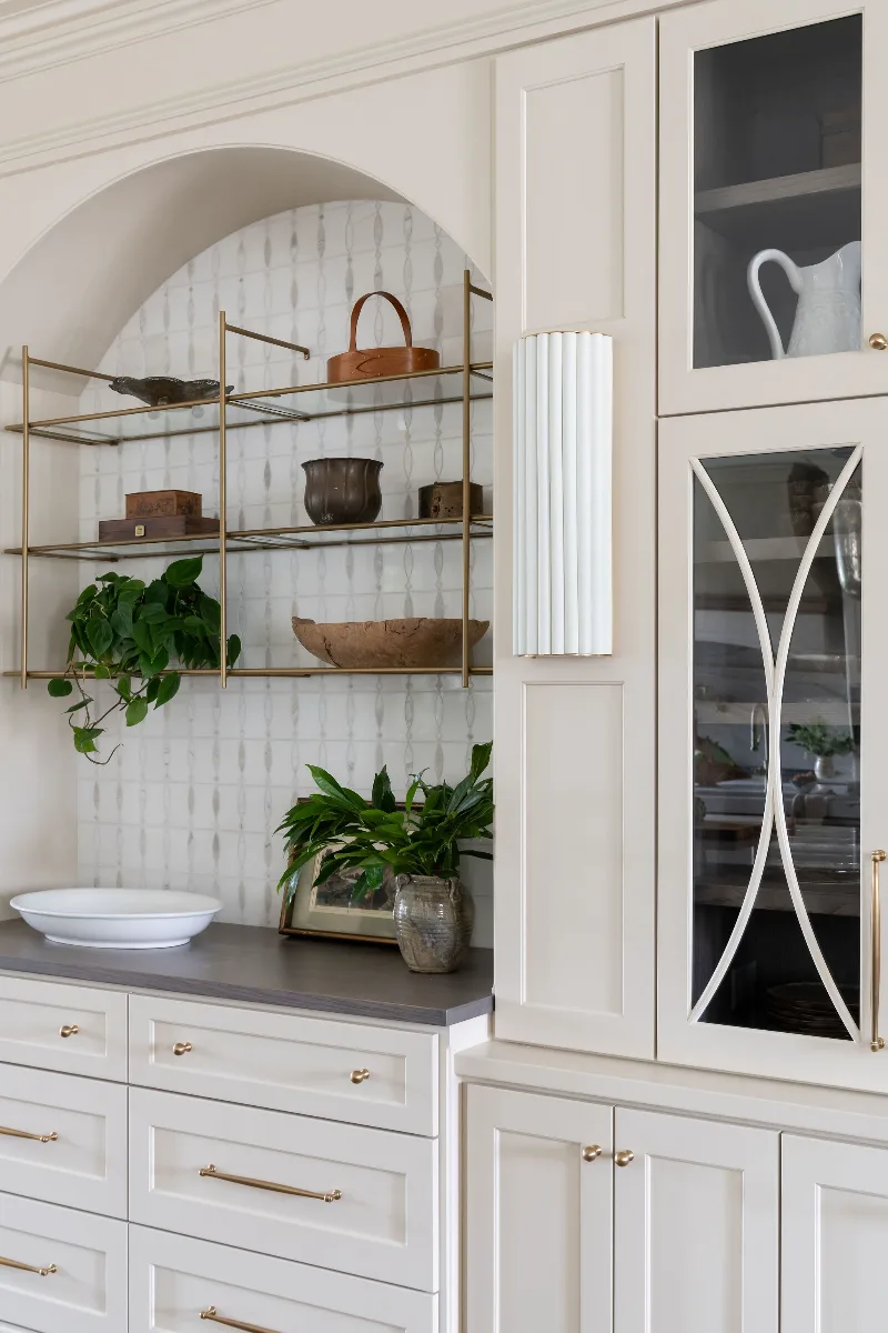 Custom kitchen remodel in McGavock Farms, Brentwood. White oak rift sawn island, Maison Blanche cabinetry, Calacatta quartz, and brass fixtures by Sebring Design Build.