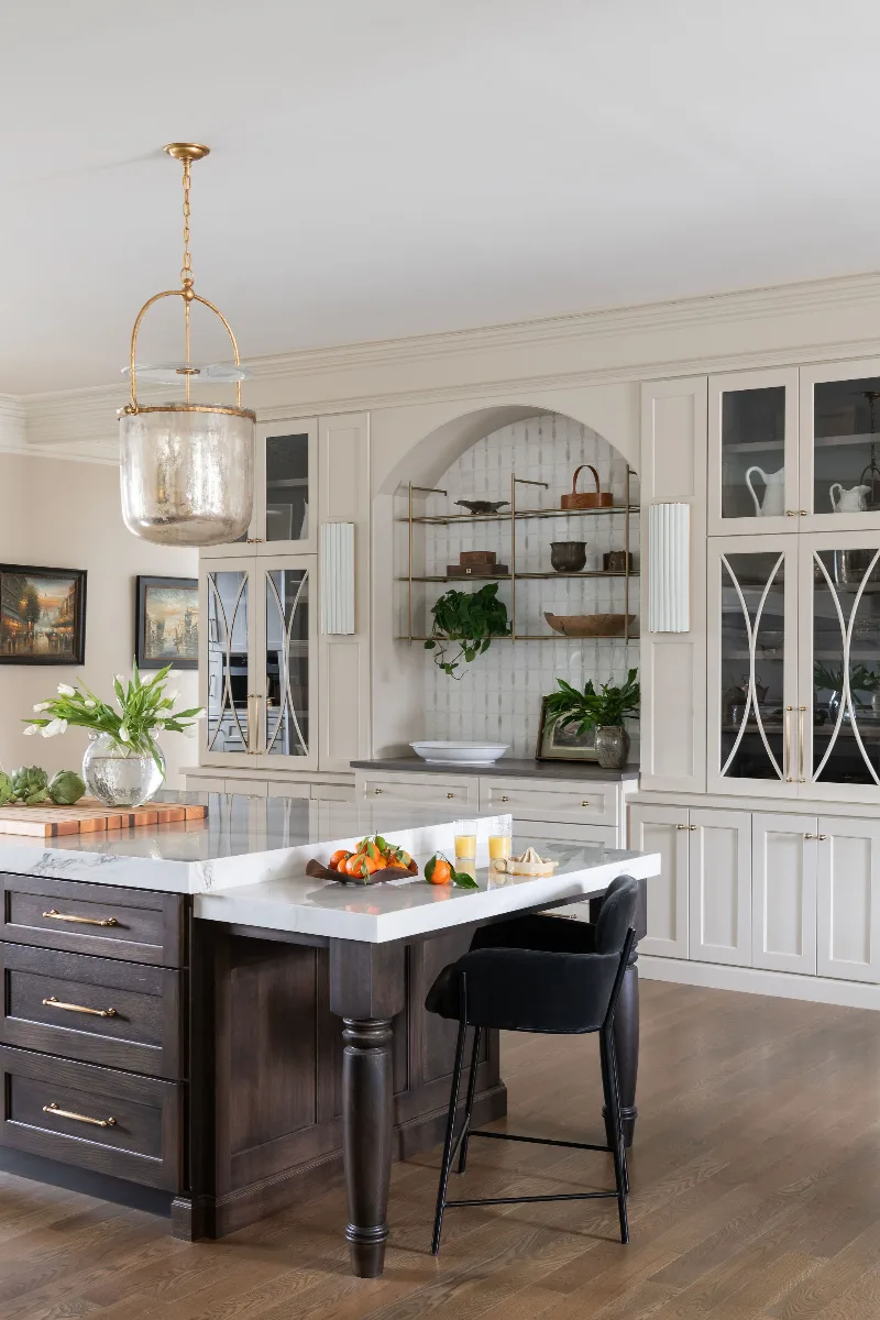 Custom kitchen remodel in McGavock Farms, Brentwood. White oak rift sawn island, Maison Blanche cabinetry, Calacatta quartz, and brass fixtures by Sebring Design Build.
