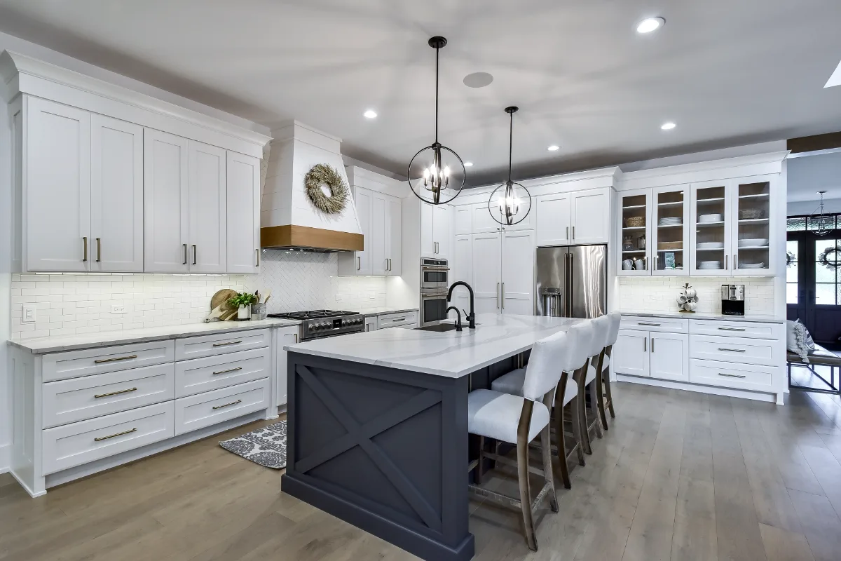 A transitional-elegant whole-home remodel in Franklin, TN. White Oak cabinetry in Sage, Cambria Brittanicca Warm quartz, and Delta Matte Black fixtures by Sebring Design Build.
