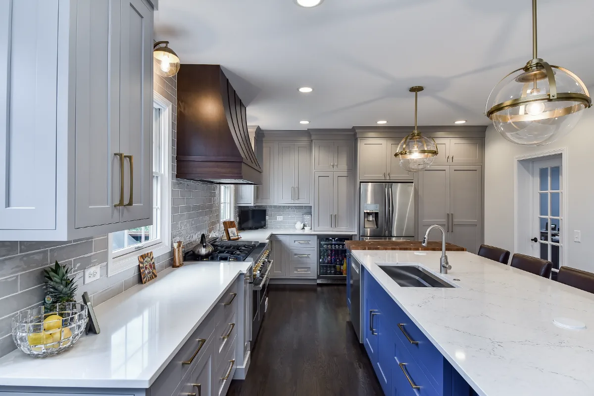 A Franklin, TN kitchen and pantry remodel with metropolitan style and two-tone cabinetry. Functional, balanced design by Sebring Design Build.