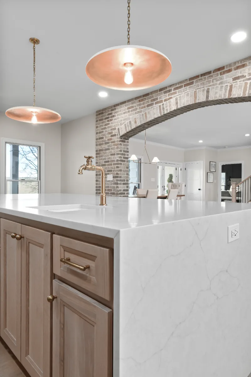 Kitchen remodel in Columbia, TN. Sebring Design Build transformed this Columbia, Tennessee kitchen with a transitional-bold design: perimeter cabinetry in Paint Grade Stone, tall cabinets in Bunker Hill Black.