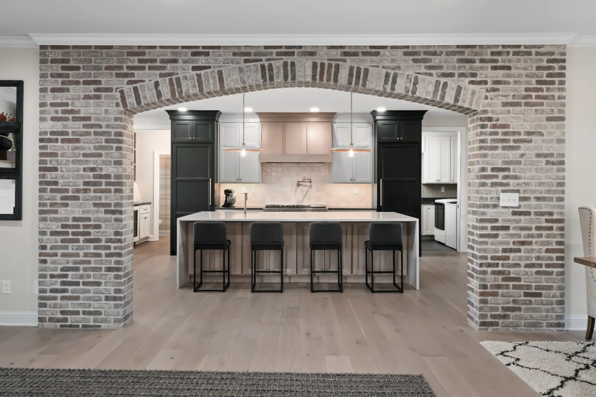 Kitchen remodel in Columbia, TN. Sebring Design Build transformed this Columbia, Tennessee kitchen with a transitional-bold design: perimeter cabinetry in Paint Grade Stone, tall cabinets in Bunker Hill Black.