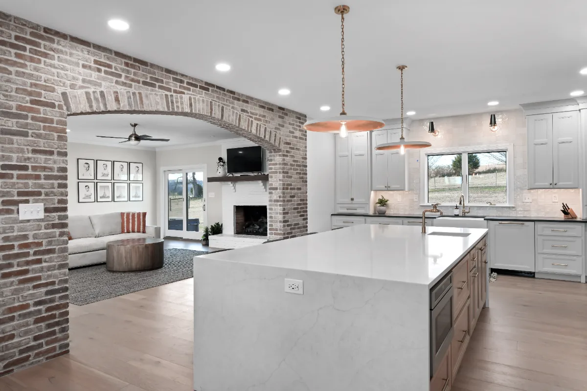 Kitchen remodel in Columbia, TN. Sebring Design Build transformed this Columbia, Tennessee kitchen with a transitional-bold design: perimeter cabinetry in Paint Grade Stone, tall cabinets in Bunker Hill Black.