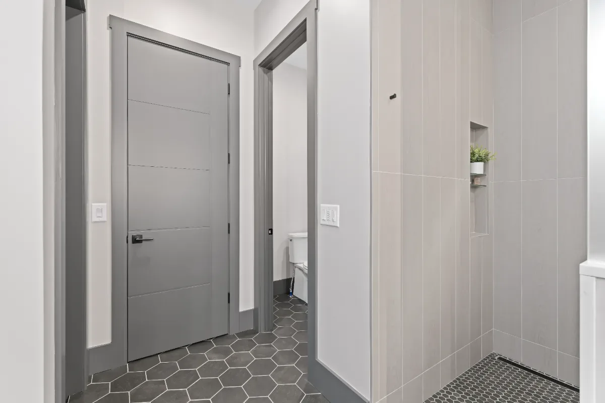 Primary Bath remodel in Westhaven, TN. Sebring Design Build transformed this Westhaven primary bath in Franklin, Tennessee with CWP Notable Slab Marion Gray cabinetry, polished quartz countertops.